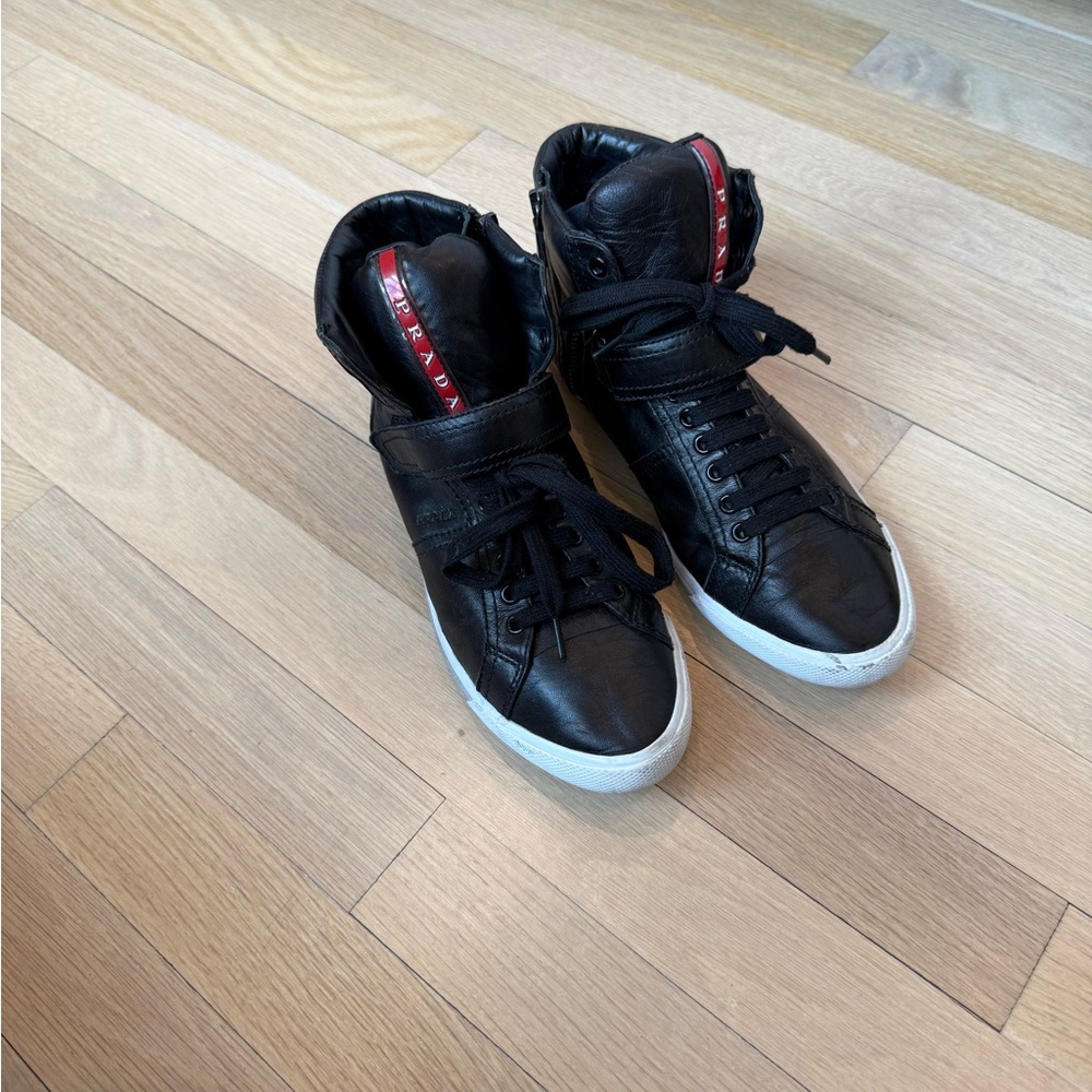 Prada high top black leather sneakers